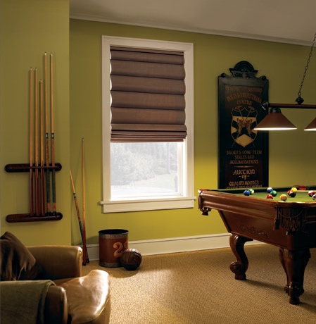 Roman shades in San Jose game room with green walls.